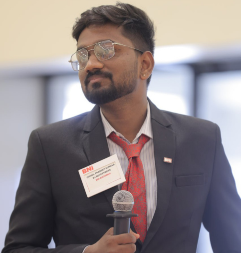 R. Vasanth Kumar speaking at a business meeting